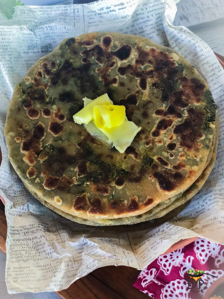 Bathua-Aloo Paratha with butter on top from Enhance Your Palate