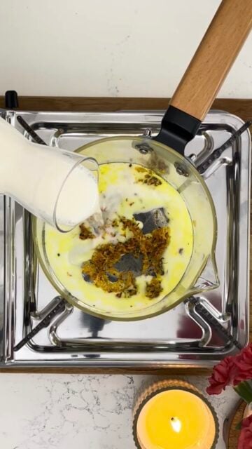 Pour milk into spices step