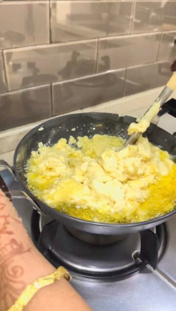 Roasting ground moong dal in ghee