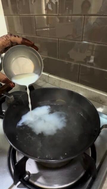 Adding a splash of milk in sugar-water mixture