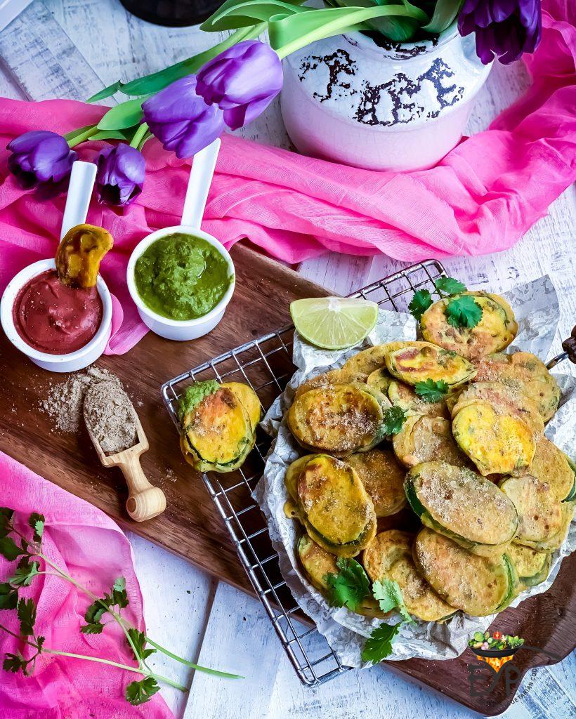 Zucchini Fritters served with mint cilantro chutney and cranberry chutney